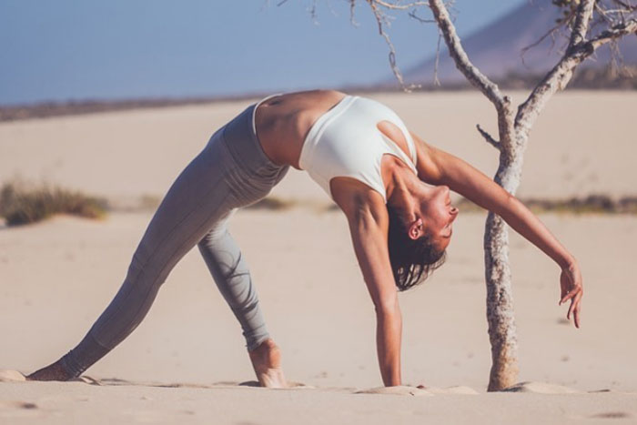 5 Yoga Poses To Zen Out In Honor Of National Yoga Day Fabfitfun