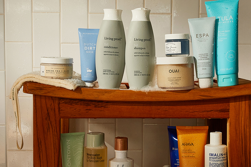 Bath products on a wooden shelf