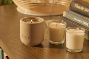 haps candles on a wood table