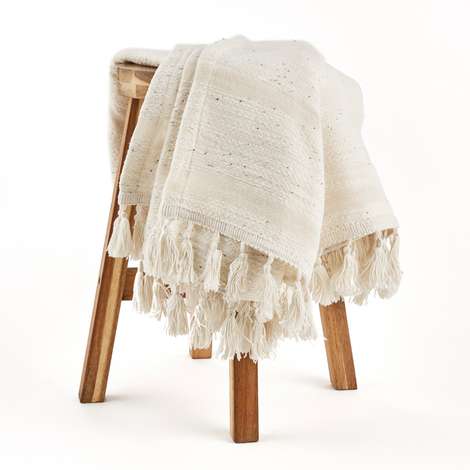 Cream tassel online throw